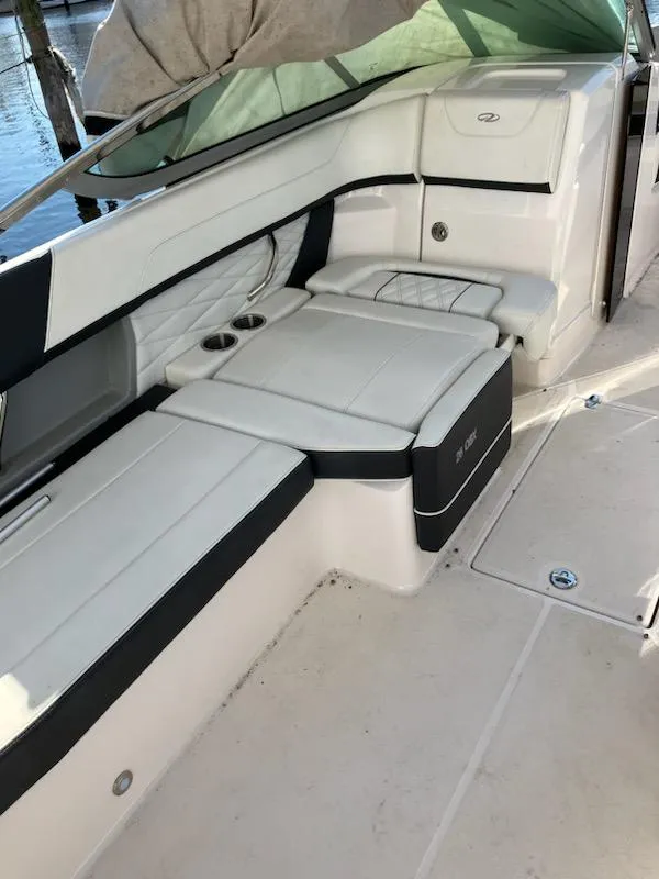 Slide: The Image of 2020 Regal 26 OBX boat interior with white leather seating. - 10