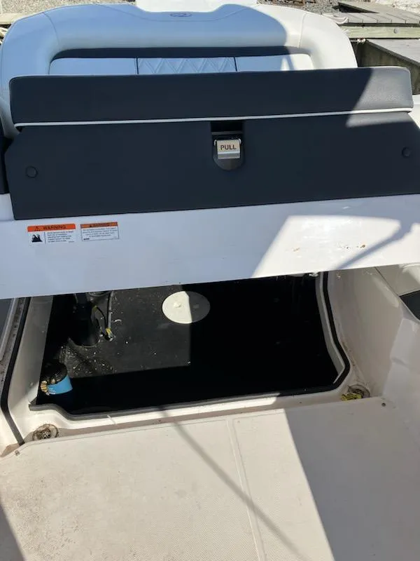 Slide: The Image of 2020 Regal 26 OBX boat interior storage compartment. - 18