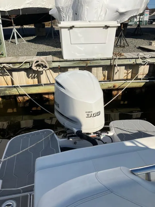 Slide: The Image of 2020 Regal 26 OBX boat with Yamaha 300 outboard motor docked. - 20