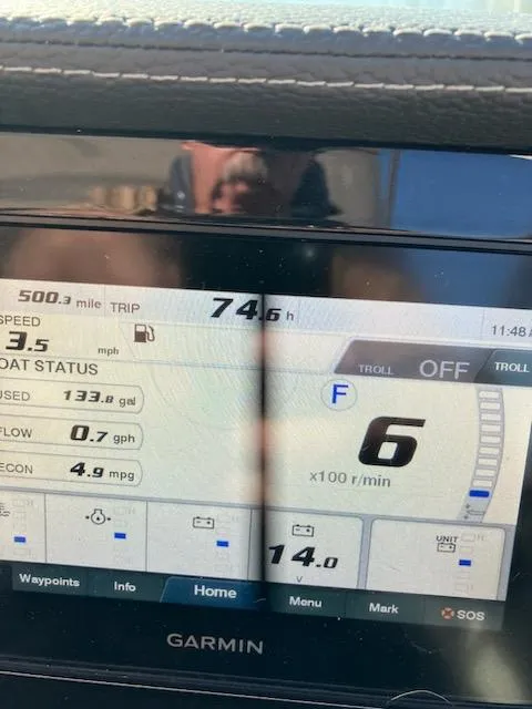Slide: The Image of Garmin display on 2020 Regal 26 OBX showing boat status and trip details. - 22