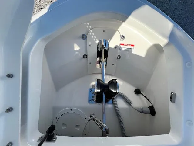 Slide: The Image of 2024 Sea Ray SLX 400 OB anchor locker with windlass and chain. - 16