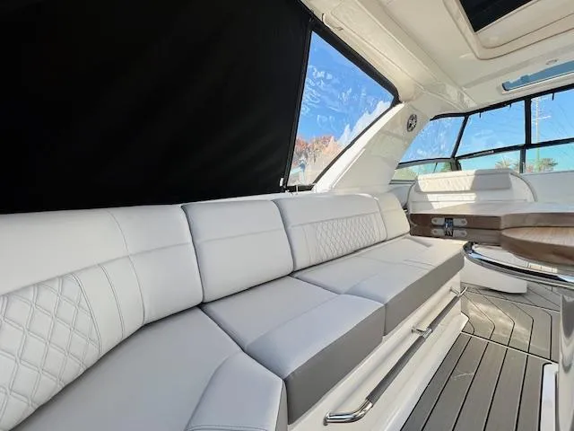 Slide: The Image of Luxurious interior seating of the 2024 Sea Ray SLX 400 OB boat. - 20