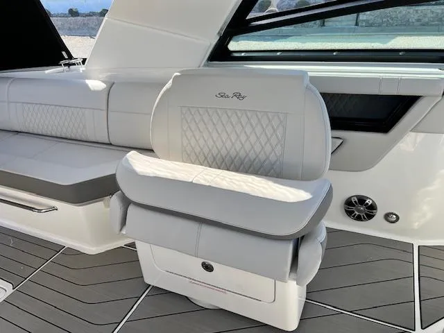 Slide: The Image of 2024 Sea Ray SLX 400 OB luxury boat seating with diamond-stitched upholstery. - 36