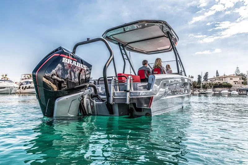 Slide: The Image of 2024 BRABUS SHADOW 300 CT luxury boat on clear water. - 13