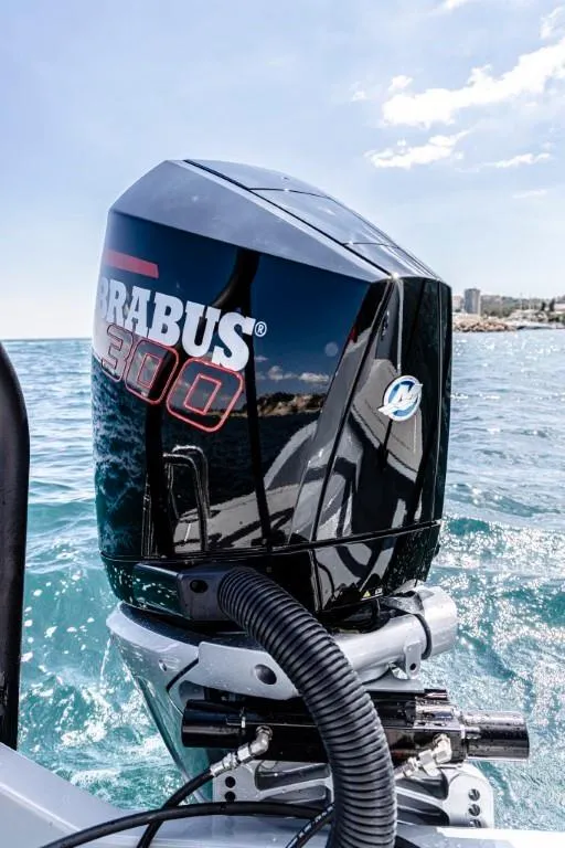 Slide: The Image of 2024 BRABUS SHADOW 300 CT outboard motor on a boat in the ocean. - 15