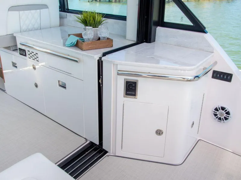 Slide: The Image of Luxurious interior of 2024 Regal 36 XO yacht with lake view. - 9