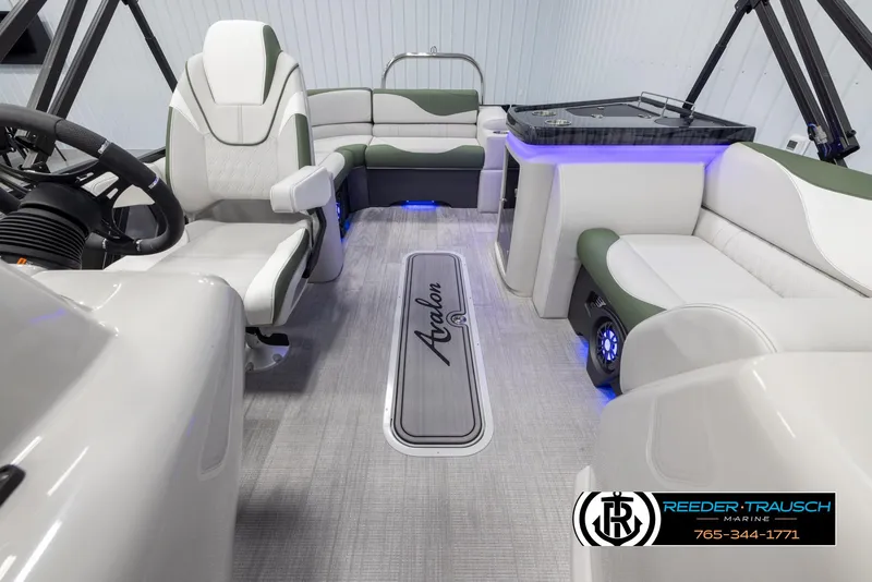 Slide: The Image of 2024 Avalon LSZ ELW boat interior with modern seating and LED lighting. - 15