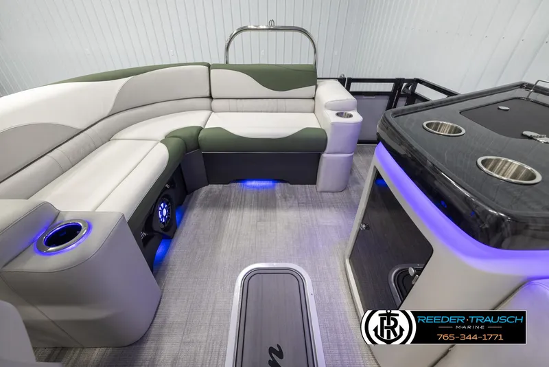 Slide: The Image of 2024 Avalon LSZ ELW pontoon boat interior with plush seating and LED lighting. - 16