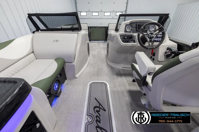 Slide: The Image of 2024 Avalon LSZ ELW boat interior with modern dashboard and seating. - 18