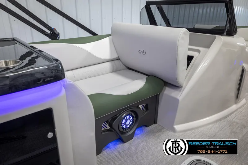 Slide: The Image of 2024 Avalon LSZ ELW boat interior with LED lighting and comfortable seating. - 23