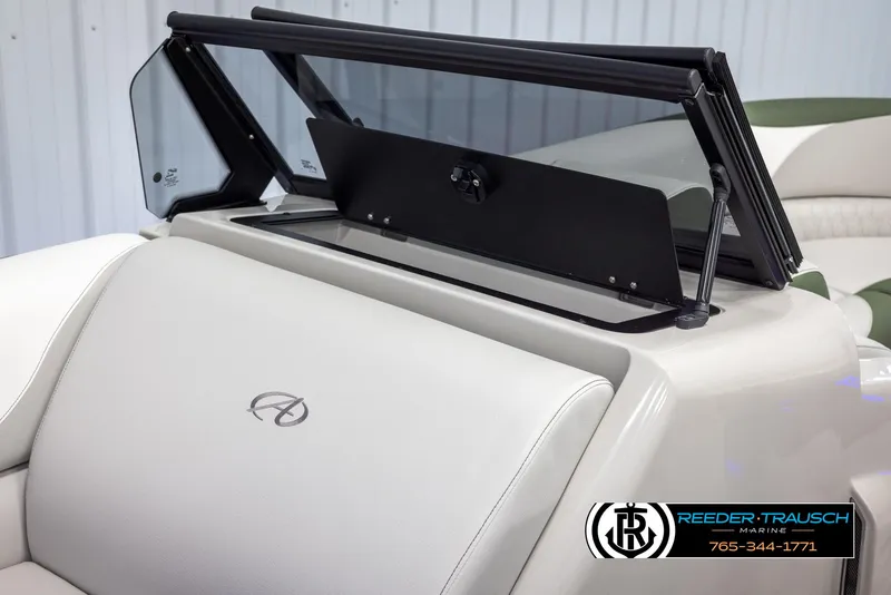 Slide: The Image of 2024 Avalon LSZ ELW boat interior with windshield and logo. - 30