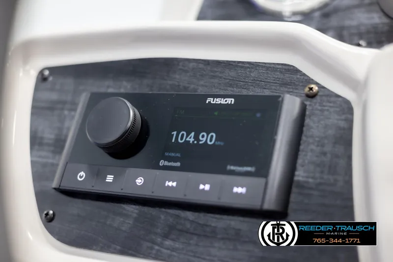 Slide: The Image of 2024 Avalon LSZ ELW boat dashboard with Fusion stereo system. - 35