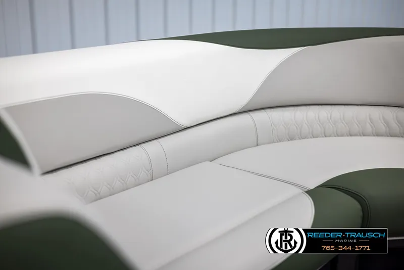 Slide: The Image of 2024 Avalon LSZ ELW boat interior with white and green upholstery. - 40