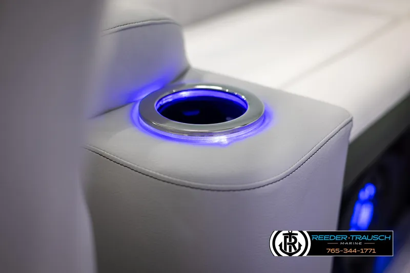 Slide: The Image of 2024 Avalon LSZ ELW illuminated cup holder in luxury seating. - 48