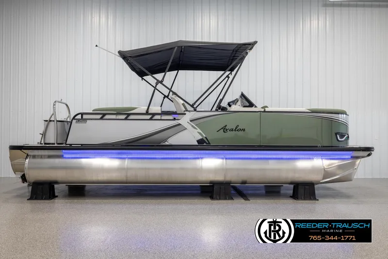 Slide: The Image of 2024 Avalon LSZ ELW pontoon boat with canopy and blue LED lights. - 6