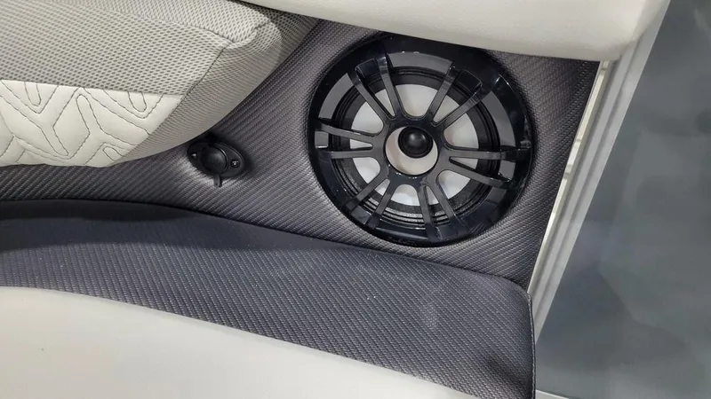 Slide: The Image of 2024 Hurricane Fundeck 2360 SBC OB interior speaker and seating detail. - 4