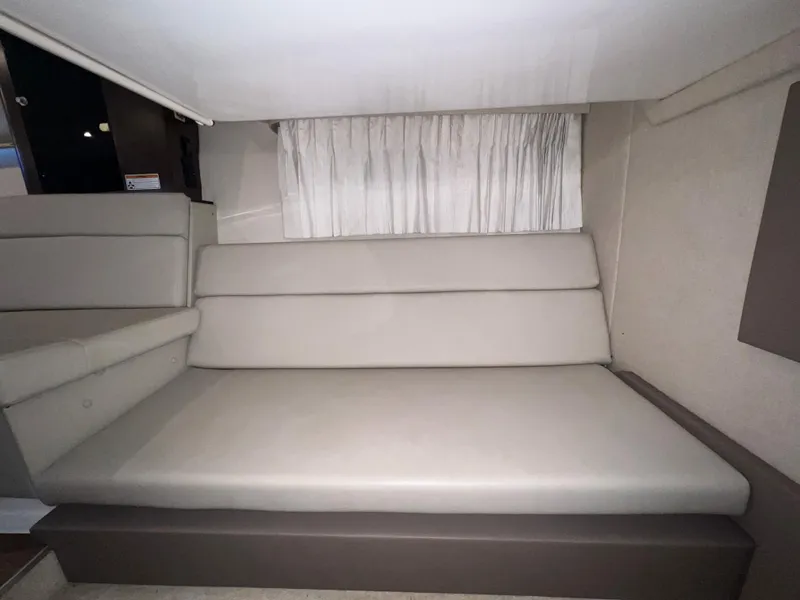 Slide: The Image of Interior seating area of a 2017 Regal 35 Sport Coupe boat. - 17