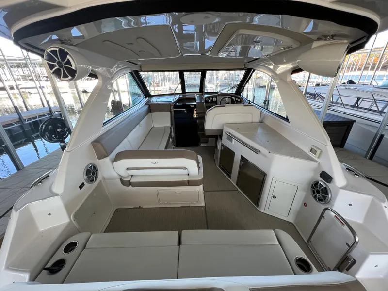 Slide: The Image of 2017 Regal 35 Sport Coupe docked in a marina. - 3