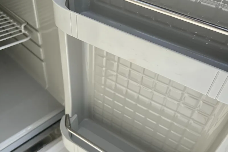 Slide: The Image of Close-up of storage compartment in 2015 Hunt Yachts Harrier Sport. - 10