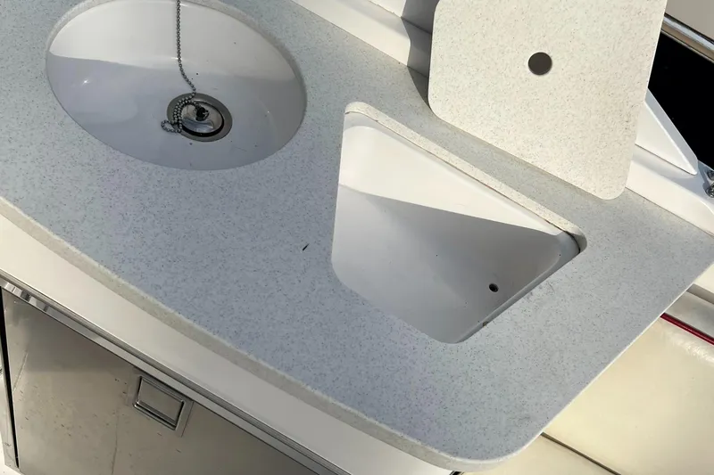 Slide: The Image of 2015 Hunt Yachts Harrier Sport sink and countertop detail. - 14