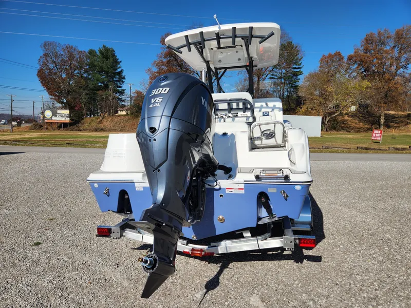 Slide: The Image of 2024 Sea Fox 248 Side Console boat with 300 V6 engine, rear view. - 2