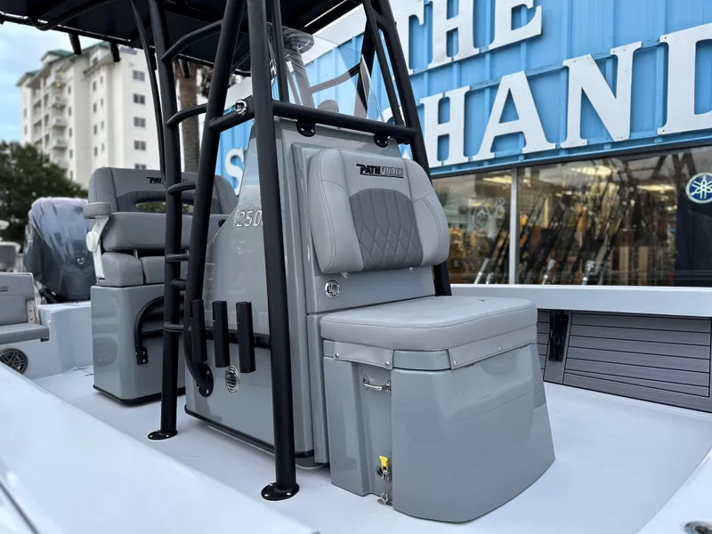 Slide: The Image of 2024 Pathfinder 2500 Hybrid boat interior with seating and storage. - 6