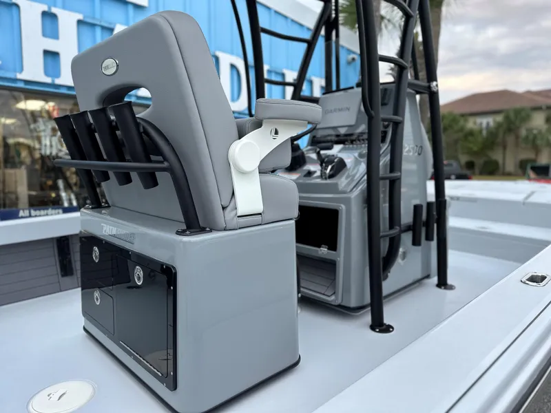 Slide: The Image of 2024 Pathfinder 2500 Hybrid boat interior with seating and storage compartments. - 8