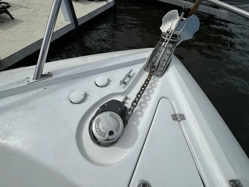 Slide: The Image of Bow of 2006 Neptunus 55 Cabrio with anchor chain and windlass. - 12