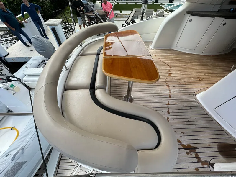 Slide: The Image of Luxury seating area on a 2006 Neptunus 55 Cabrio yacht. - 15