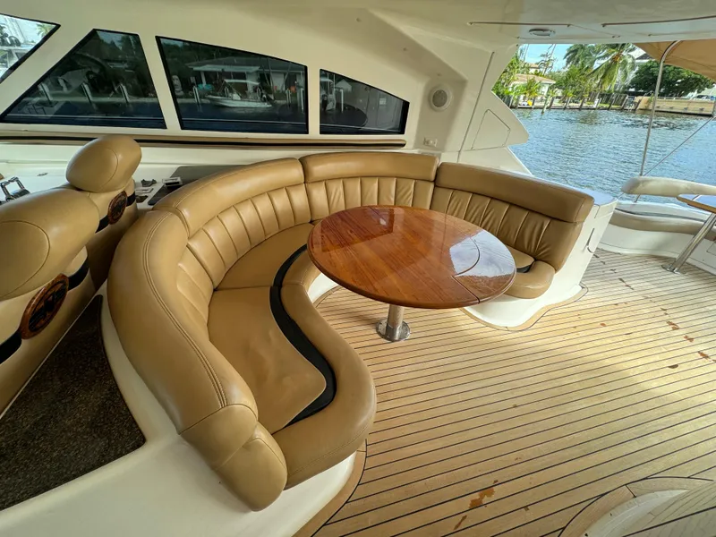 Slide: The Image of Luxurious seating area on a 2006 Neptunus 55 Cabrio yacht. - 27