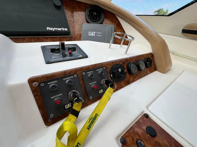 Slide: The Image of Control panel of a 2006 Neptunus 55 Cabrio yacht with Raymarine and CAT systems. - 36