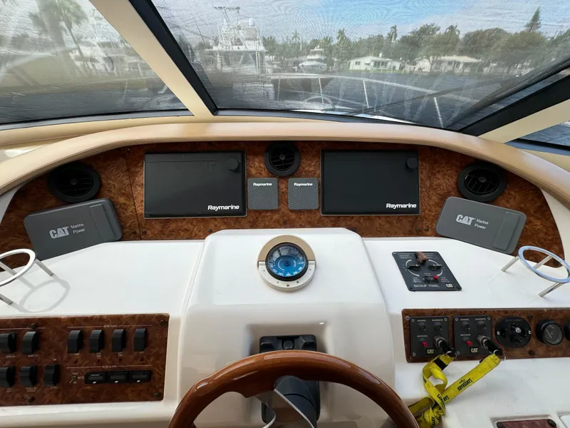 Slide: The Image of Control panel of a 2006 Neptunus 55 Cabrio yacht with Raymarine displays. - 37