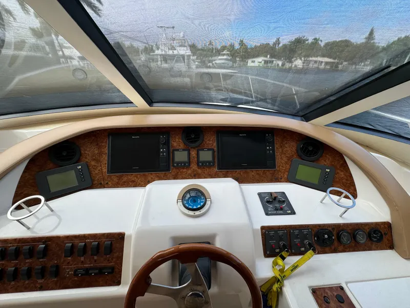 Slide: The Image of Control panel of a 2006 Neptunus 55 Cabrio yacht with navigation instruments. - 39