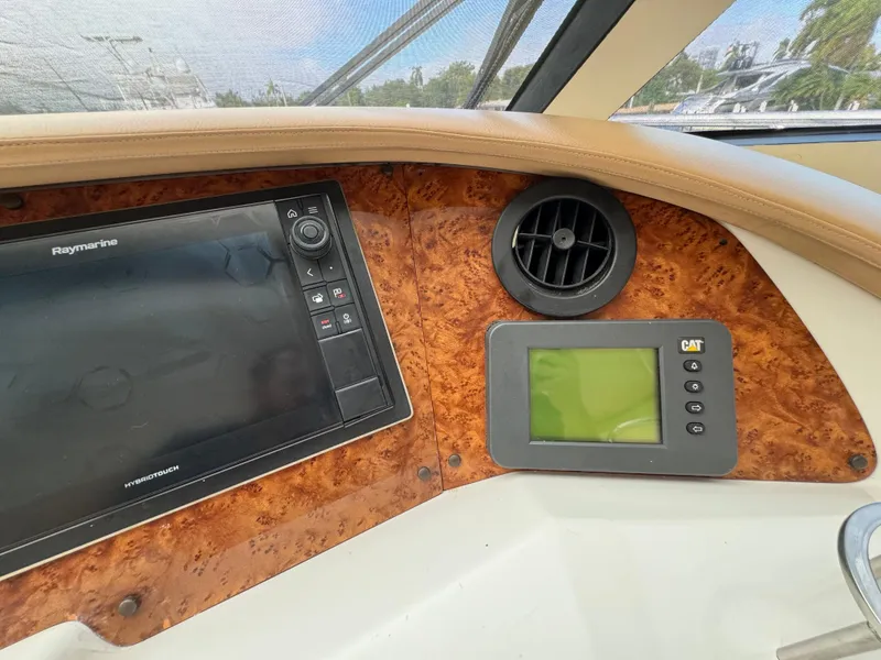 Slide: The Image of Control panel of a 2006 Neptunus 55 Cabrio yacht with navigation and monitoring systems. - 40