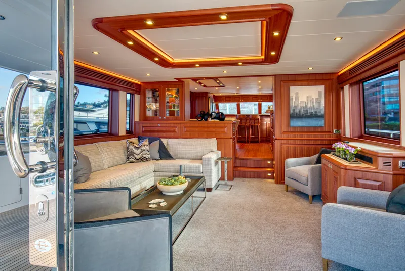 Slide: The Image of Luxurious interior of 2025 Hampton 750 Endurance LRC yacht with elegant wood finishes. - 10