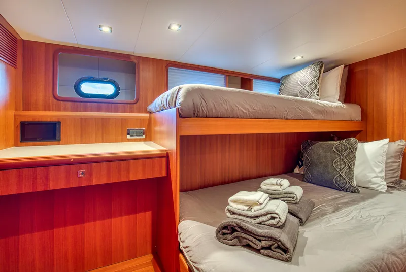 Slide: The Image of Cozy cabin with bunk beds in 2025 Hampton 750 Endurance LRC yacht. - 14