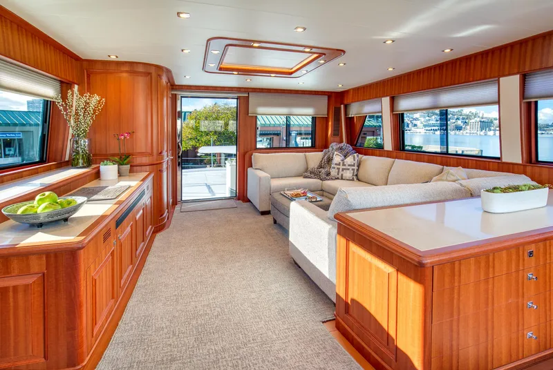 Slide: The Image of Luxurious interior of 2025 Hampton 750 Endurance LRC yacht with elegant wood finishes. - 27