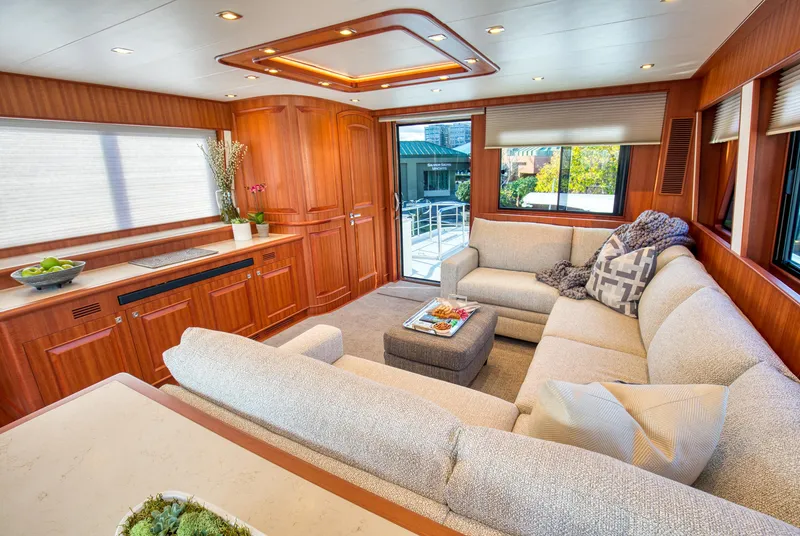 Slide: The Image of Luxurious interior of 2025 Hampton 750 Endurance LRC yacht with plush seating and elegant wood finishes. - 28