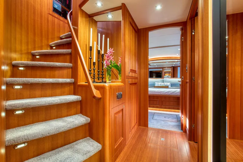Slide: The Image of Luxurious interior of 2025 Hampton 750 Endurance LRC yacht with elegant wood finishes. - 33