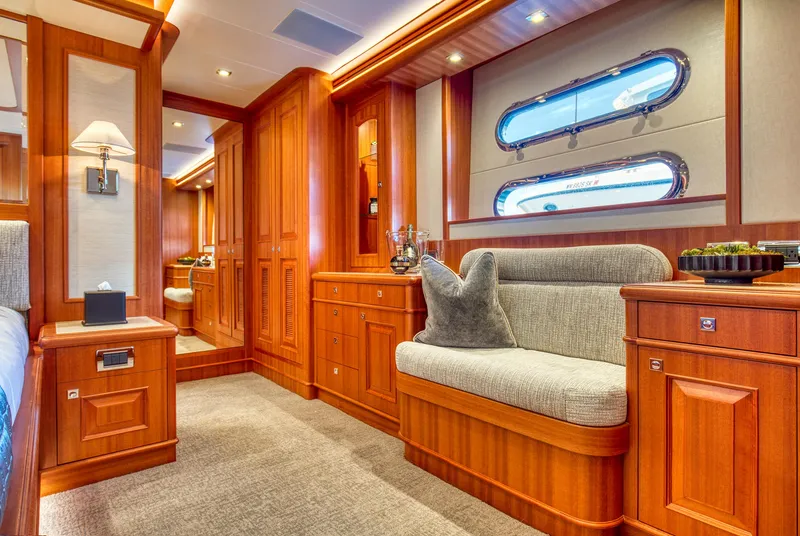 Slide: The Image of Luxurious interior of 2025 Hampton 750 Endurance LRC yacht with elegant wood finishes. - 38