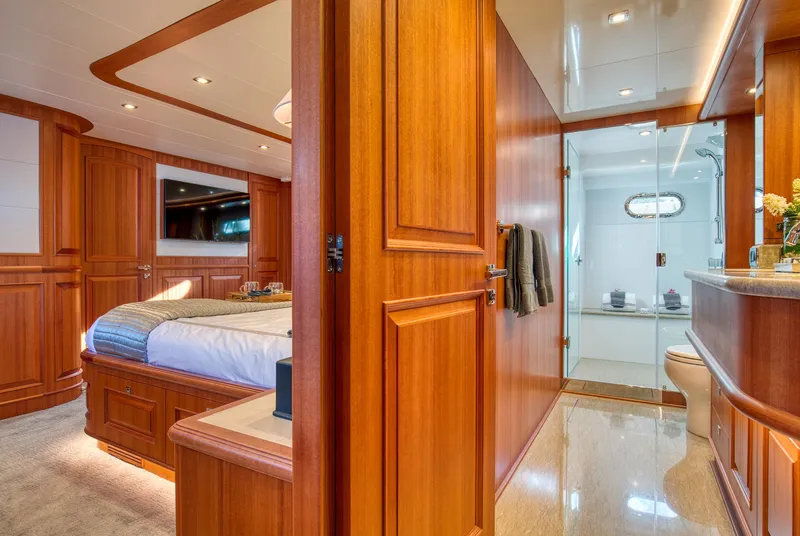 Slide: The Image of Luxurious interior of 2025 Hampton 750 Endurance LRC yacht with wood finishes and modern amenities. - 39