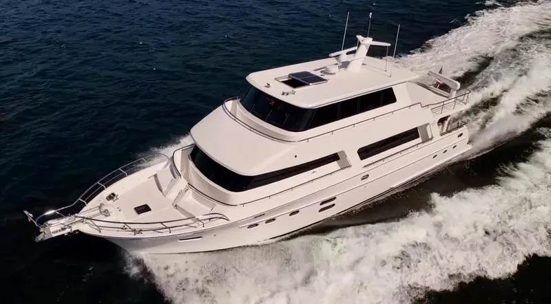 Slide: The Image of Luxury yacht Hampton 750 Endurance LRC 2025 cruising on open water. - 6