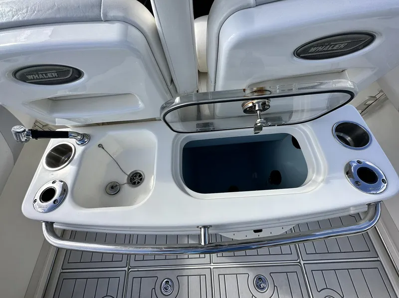 Slide: The Image of Boston Whaler 280 Outrage 2014 boat sink and storage compartment. - 12