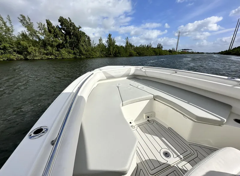 Slide: The Image of 2014 Boston Whaler 280 Outrage boat on a scenic waterway. - 20