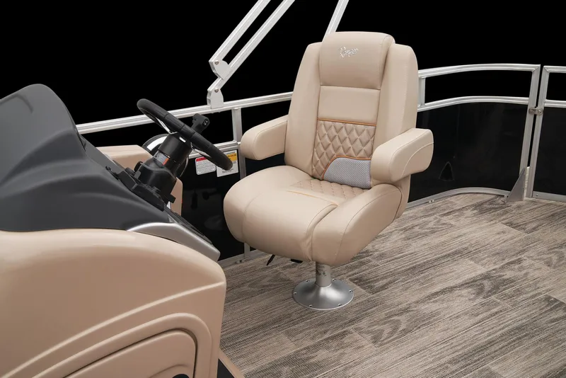 Slide: The Image of 2024 Ranger Reata 220C boat captain's chair and helm station. - 20