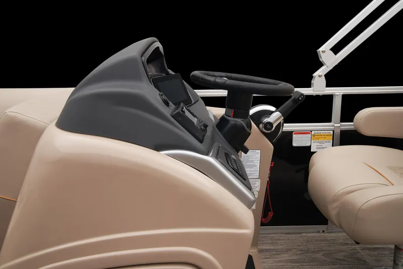 Slide: The Image of 2024 Ranger Reata 220C boat steering console and seating. - 25