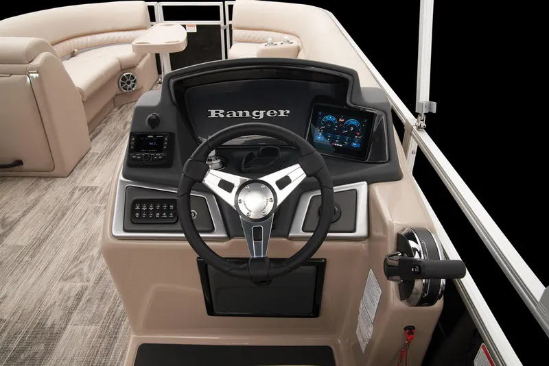 Slide: The Image of 2024 Ranger Reata 220C boat dashboard with steering wheel and control panel. - 26