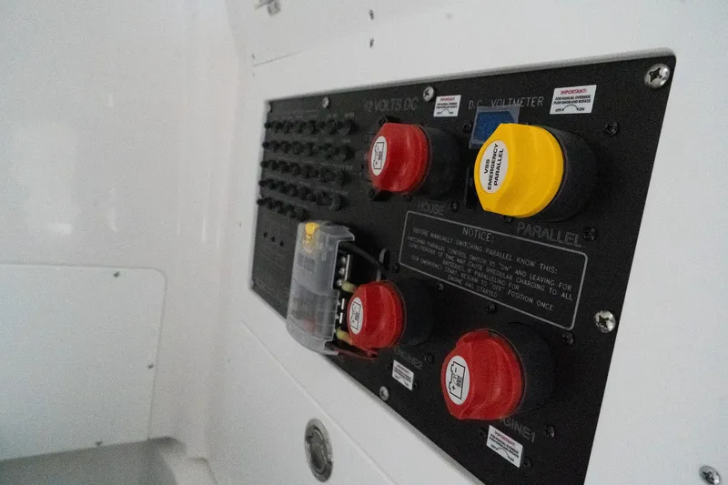 Slide: The Image of 2024 Caymas 281 HB control panel with switches and battery selectors. - 10