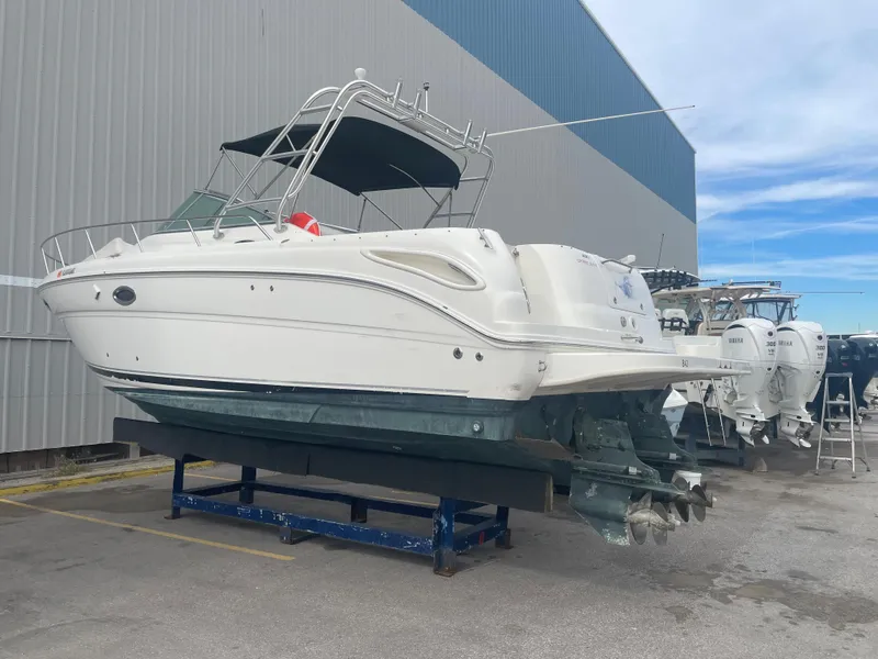 Slide: The Image of 2006 Sea Ray 290 Amberjack boat on dry dock, side view. - 17