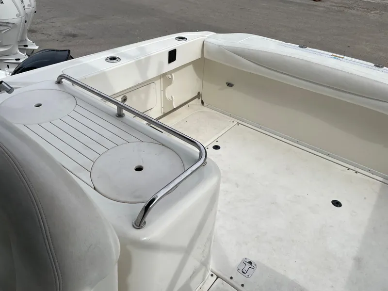 Slide: The Image of 2006 Sea Ray 290 Amberjack boat deck with seating and storage. - 34